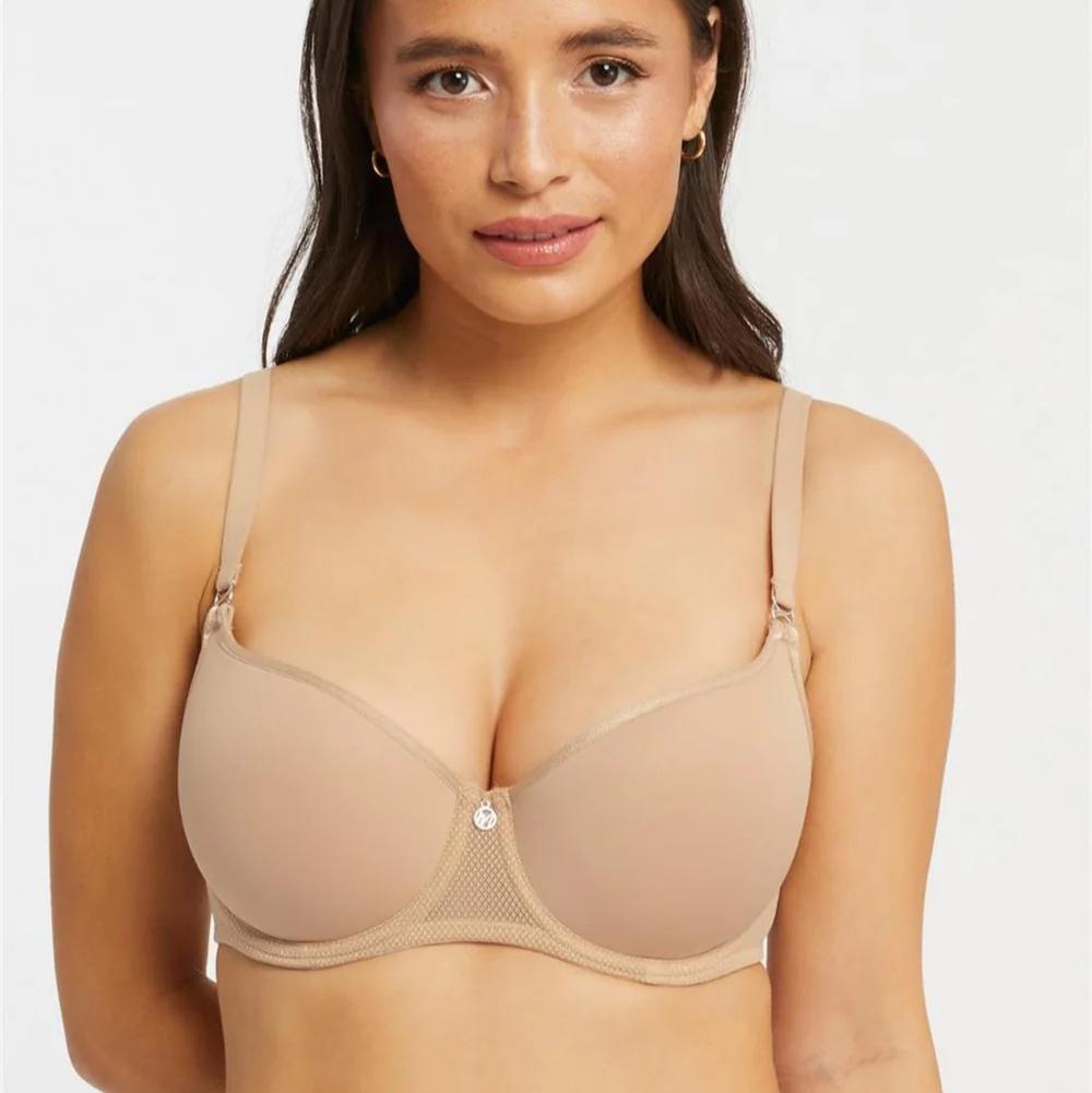 Woman wearing a beige bra smooth t-shirt bra