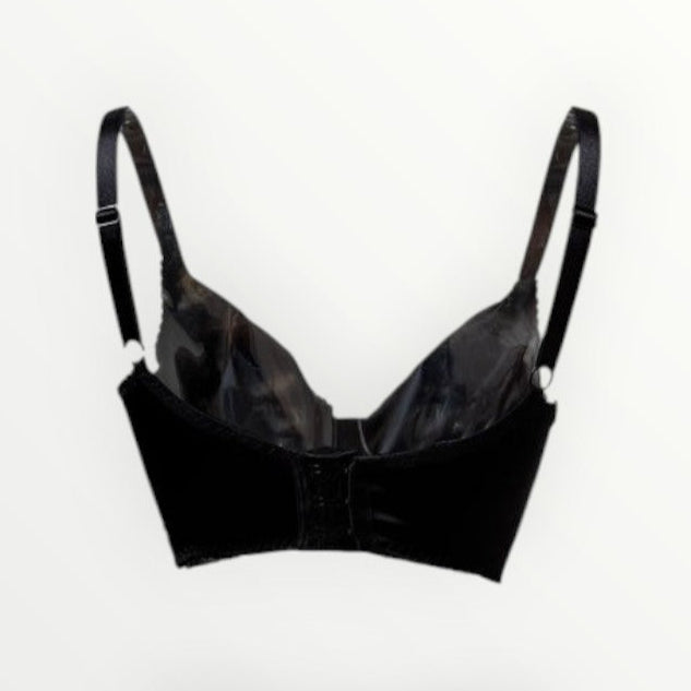 Black bra with thin straps on a white background