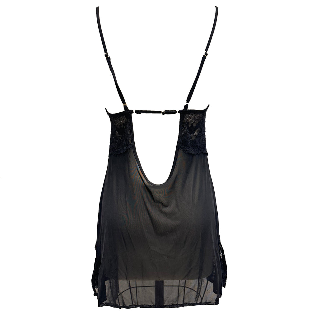 Black sheer top with straps on a white background