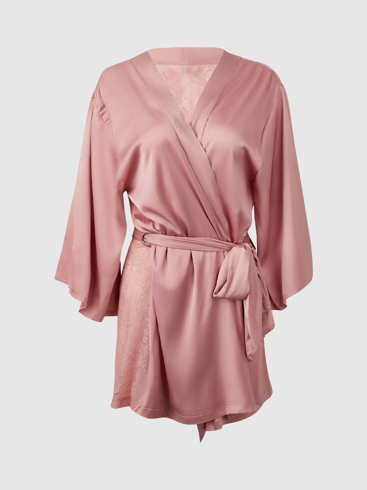 Pink satin and lace short robe on a light gray background