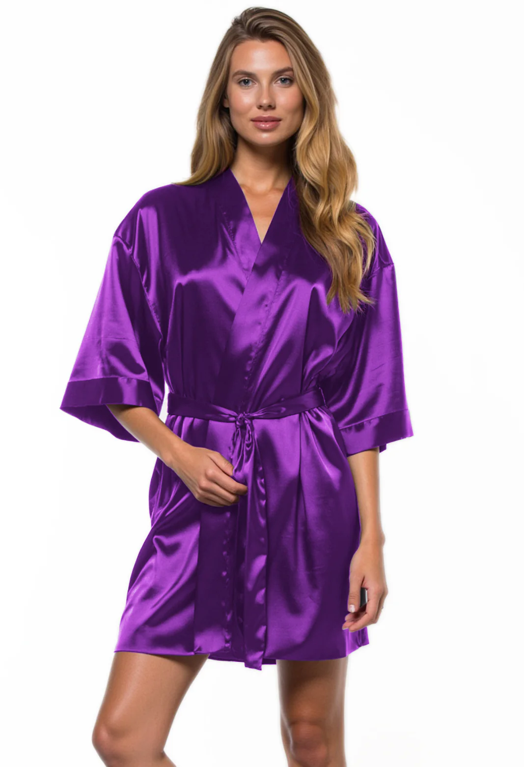 Woman wearing a purple satin robe on a white background
